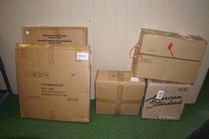lot 216 image: Assorted Home Goods -Light Fixtures, Sink, Toilet Tank, Clock