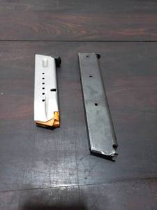 lot 56 image: Colt 45 Auto And Smith And Wesson 9MM Magazine
