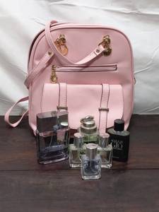 lot 70 image: Collection Of Womans Perfume With Pink Bag