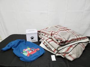 lot 215 image: FullQueen Holiday Throw Blanket, Dog Food Container, And Dog Hoodie