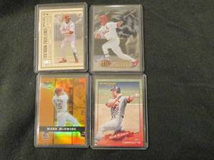 4 Assorted Mark McGwire Cards...