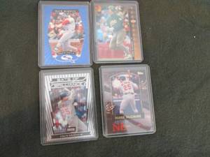 4 Assorted Mark McGwire Cards...