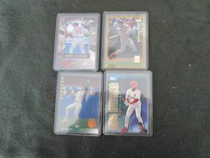 4 Assorted Mark McGwire Cards...