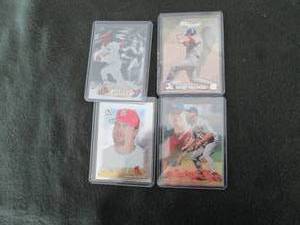 4 Assorted Mark McGwire Cards...