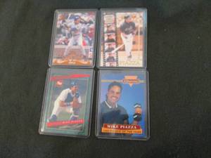 lot 151 image: 4 Assorted Mike Piazza Cards...