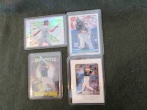 4 Assorted Mike Piazza Cards...