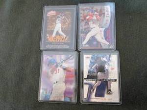 lot 190 image: 4 Fleer Mike Piazza Cards...