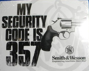 lot 48 image: Smith & Wesson Tin Sign