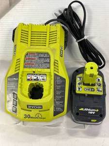 lot 8 image: Ryobi 18 Volt Lithium Ion Battery & Quick Charger