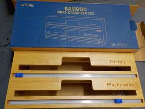 lot 22 image: Bamboo Wrap Organizer...