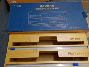 lot 23 image: Bamboo Wrap Organizer...