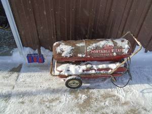 Sears kerosene heater for parts or repair. 12 full of fuel. As shown.