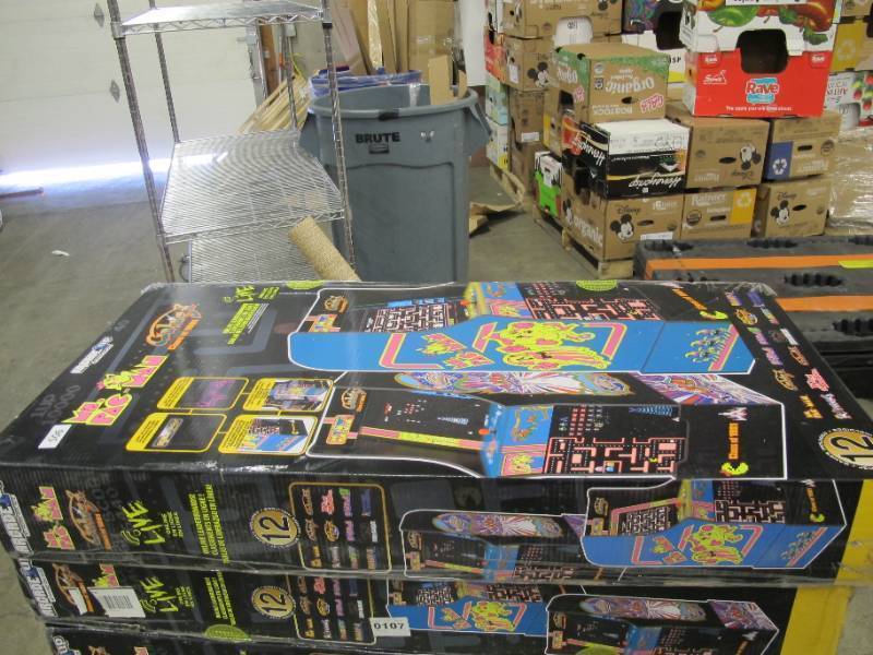 lot 76 image: NEW in Distressed Box Arcade 1Up Ms. Pac-ManGalaga Arcade Console - Unassembled