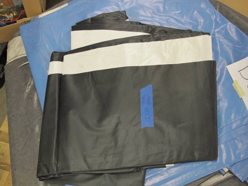 lot 116 image: NEW Vinyl Tarp - 12 x 24  Black  White Vinyl tarp - 9 oz. Lightweight Duty - DIRTY
