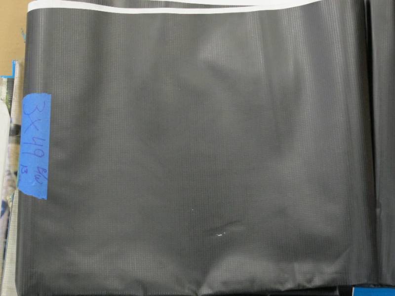 lot 133 image: NEW Vinyl Tarp - 3 x 49 Black  White Vinyl tarp - 13 oz. Medium-Lightweight Duty - DIRTY