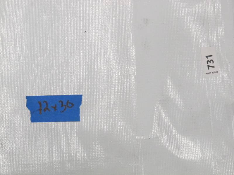 lot 139 image: NEW Vinyl Tarp - 12 x 30  Black  White Vinyl tarp - 9 oz. Lightweight Duty