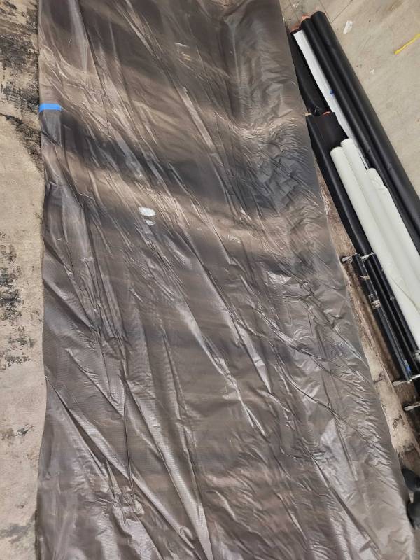 lot 141 image: NEW Vinyl Tarp - 16 x 40  Black  White Vinyl tarp - 9 oz. Lightweight Duty