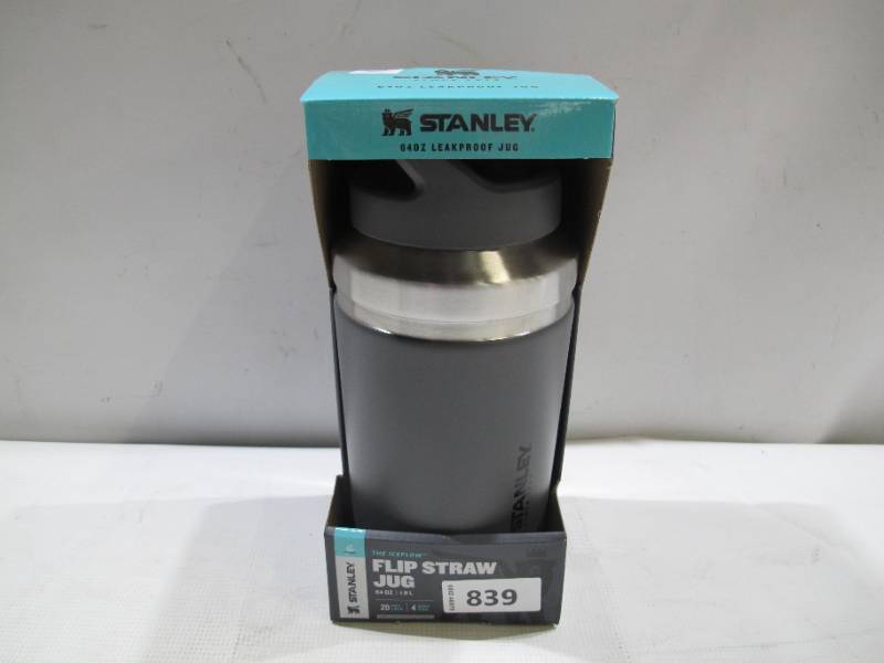 lot 839 image: NEW Stanley GO Flip Straw Jug - 64 oz. - Charcoal