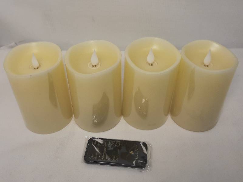 lot 905 image: Illure 4-Pack 5 Inch Lumi360 Battery Operated Candles Ivory w Remote