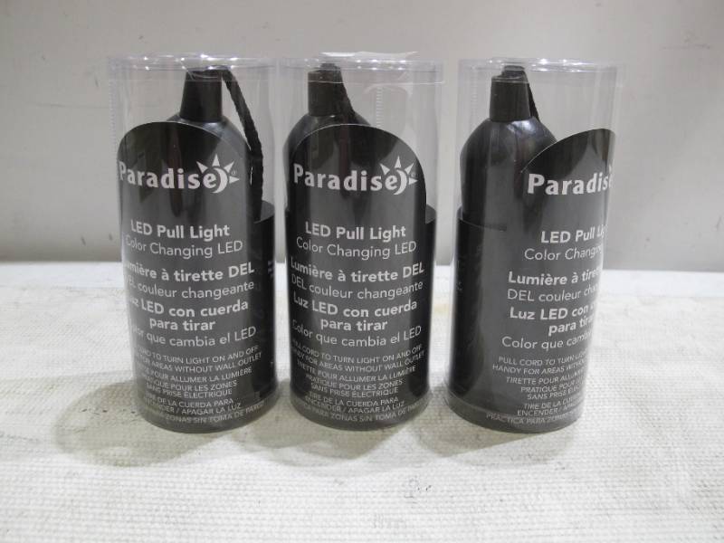 lot 923 image: NEW 3 Pack of PARADISE LIGHTING GL39899 LED COLOR CHANGING PULL CORD BULBS, COOL WHITE