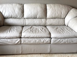 lot 3 image: Taupe Colored Leather Sofa