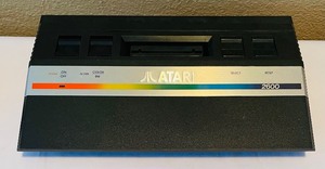 lot 109 image: Vintage Atari 2600 Gaming System with Games, Accessories and Manuals