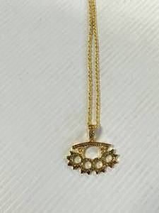 lot 22 image: Brass Knuckles Necklace