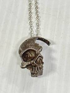lot 62 image: Metal Half Skull Face Necklace