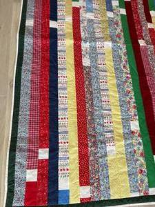 lot 57 image: Handmade Brightly Colored Quilt