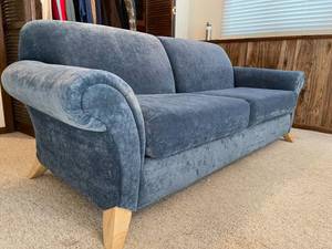lot 77 image: Sofa with Wooden Legs by Schweiger