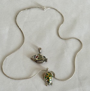lot 31 image: Sterling Silver Chain and Turtle Pendant