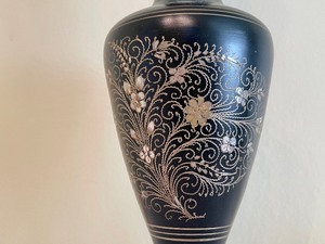 lot 130 image: Black Vase with Floral Accents