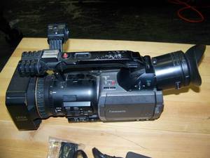 lot 41 image: Panasonic 3CCD MiniDV Camera with Remote Control and AC Adapter  Charger