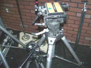 lot 88 image: Various Tripod Heads, Tripods, Tripod Spreaders on Wheels and Adjustable Microphone  Mic Stands