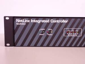 lot 19 image: AMX NetLinx Integrated Controller NI-2000  No Cords included  Perfect for control and automation features common in a single room, including VCRDVD players, projectors, lighting, thermostats and other electronic equipment