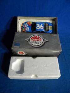 lot 58 image: Ernie Irvan #36 M&M Pedigree Brand 1999 Pontiac 124 NASCAR Collectable