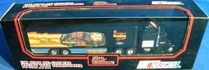 lot 206 image: NASCAR Racing Team Transport Die Cast #28 with Rear Opening Door