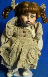 lot 233 image: Collectible Memories Genuine Porcelain Doll Emily