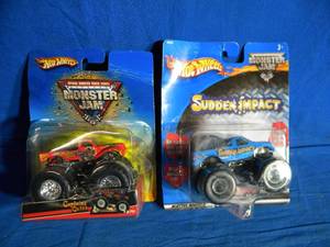 lot 280 image: Hot Wheels Monster Trucks Captains Curse and Sudden Impact