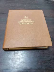 lot 15 image: American Commemorative Collections Stamp book