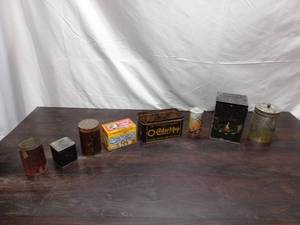 lot 65 image: Tins & Schells Can