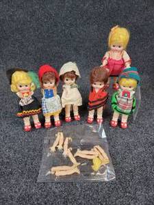 lot 56 image: Lot of (6) 1950s Dolls of All Nations Dolls with Opening and Closing Eyes