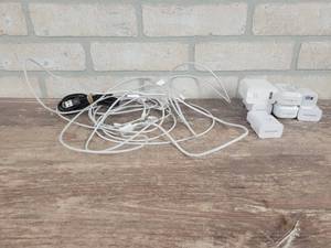 lot 90 image: (7) iPhone Charging Cables and Power Supplies