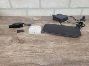 lot 102 image: New Apple Headphones, InVue PK4400 Key FOB, and Wireless Charger Pad