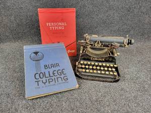 lot 132 image: Antique Corona Folding Portable Typewriter No. 3 with Pair of Typing Books