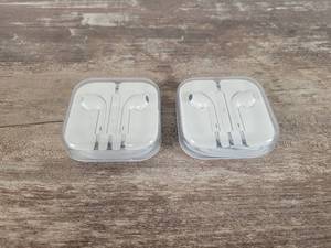 lot 108 image: (2) Sets of APPLE Headphones in Cases