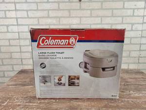 lot 128 image: New in Box COLEMAN Large Flush Toilet