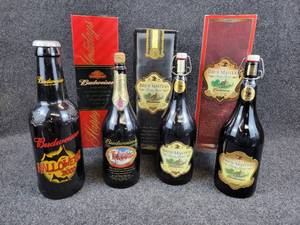 lot 142 image: Lot of (4) Budweiser Bottles - Halloween, 125th Anniversary, and 2005 & 2007 Brew Masters Private Reserve
