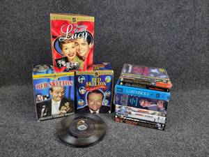 lot 147 image: Lot of VHS Tapes, DVDs, 45s, and Boos on Tape - Includes Red Skelton, Lucy, George Burns, Sharknado, and MORE