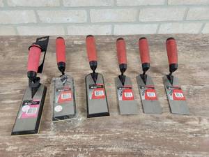 lot 242 image: (3) 6 Margin Trowels and (3) 6 Float Margin Trowels